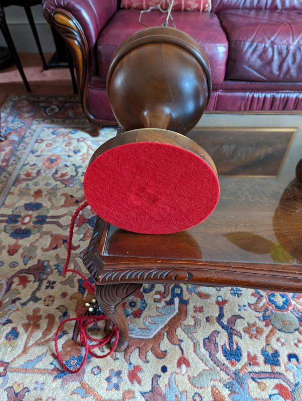 Self-adhesive red felt used on the bottom.